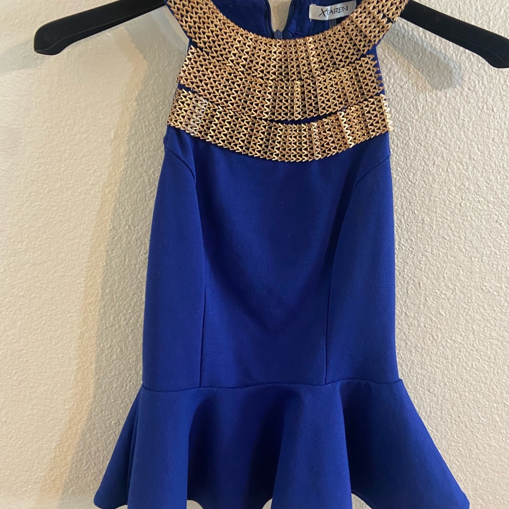 Royal blue peplum gold top